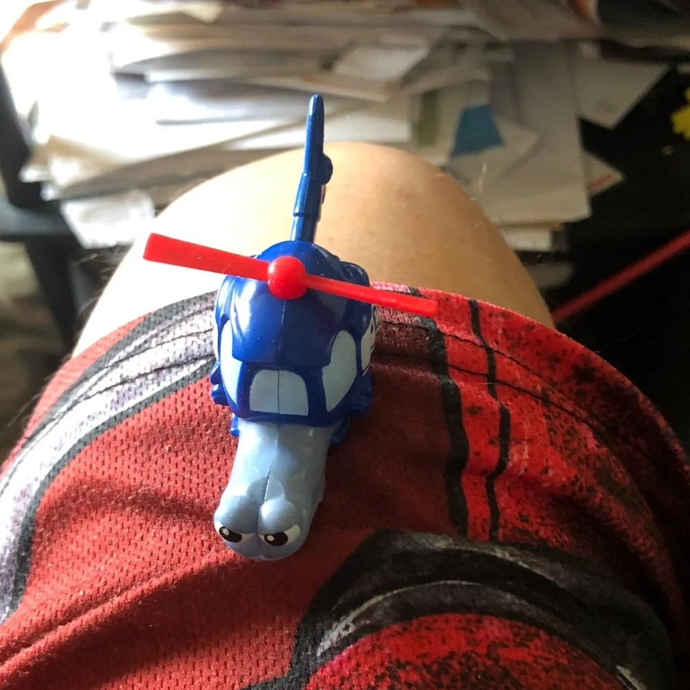 Blue Toy Helicopter with Red Rotor